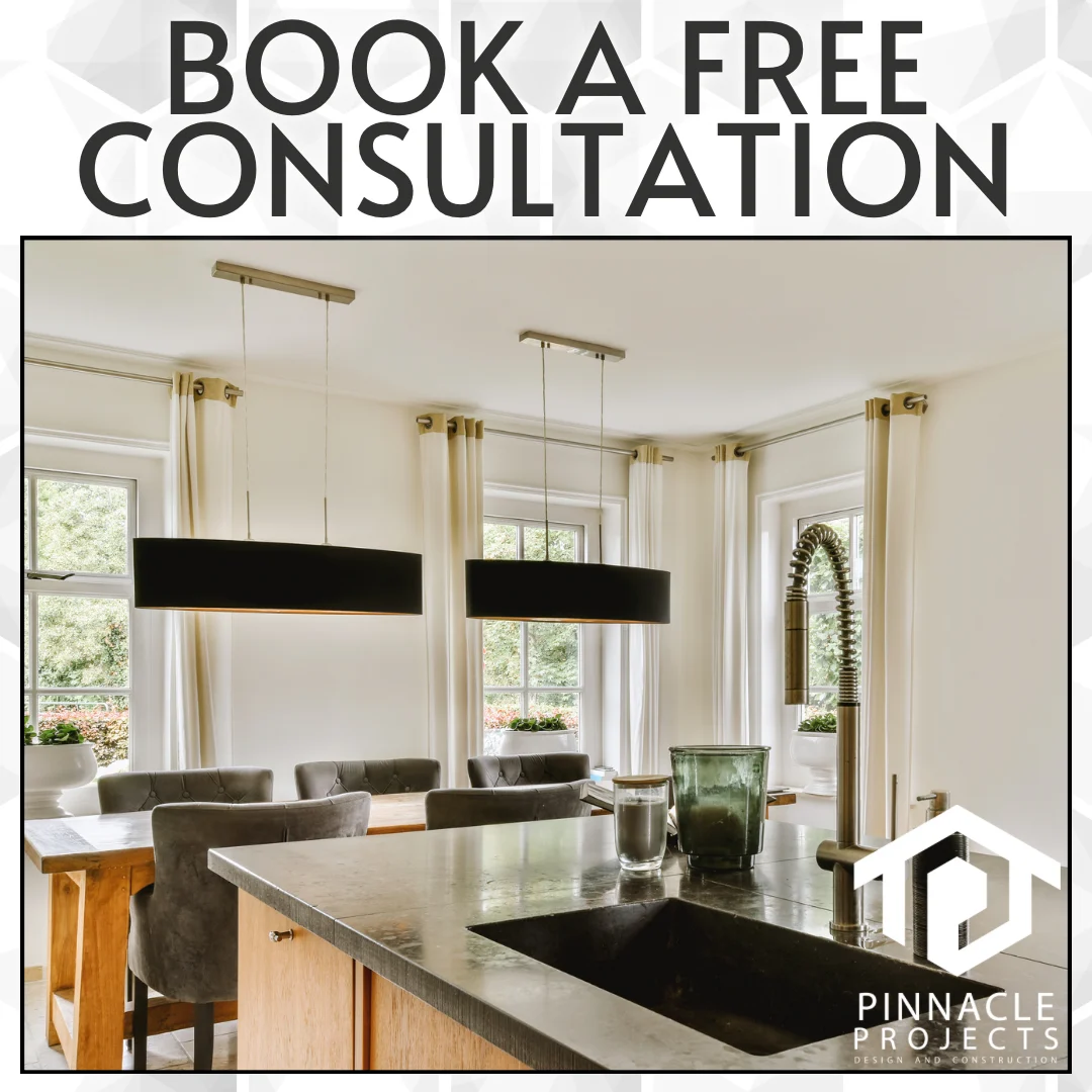 Kitchen island, sink and dining area; text “BOOK A FREE CONSULTATION” and “PINNACLE PROJECTS”