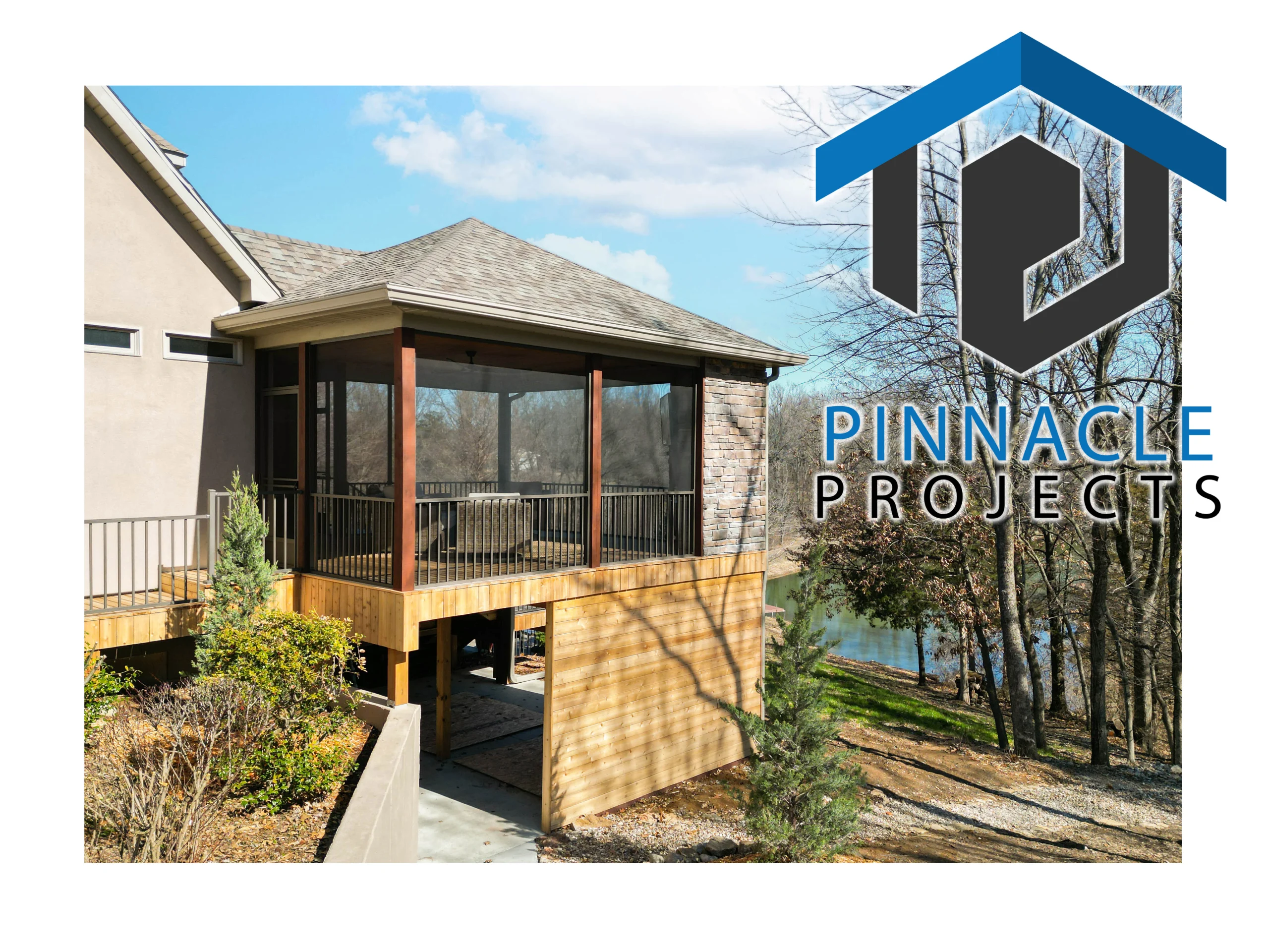 Screened porch with wood posts and railings beside trees and water; large “Pinnacle Projects” logo